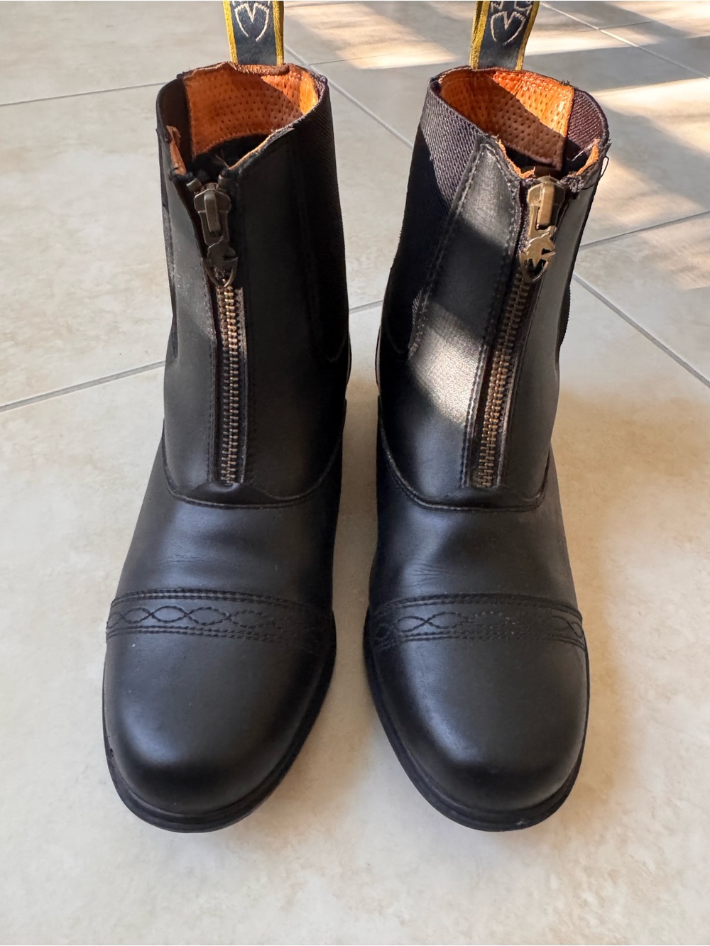 Front-Zip Black Leather Moretta Equestrian Ankle Boots with Decorative Stitching